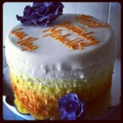 Orange Ombre Cake With Deep Purple Roses