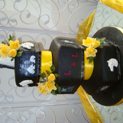 Black Cake, White Horses, Yellow Roses And Photos