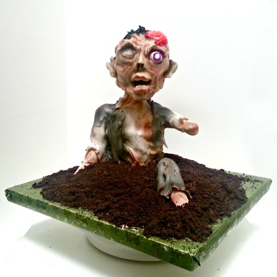 Zombie Cake Covered In Modeling Chocolate With Fondant Accents on Cake Central