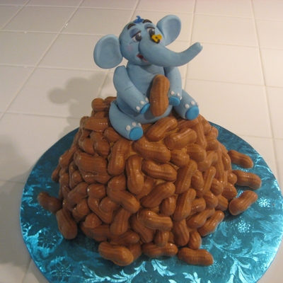 Happy Elephant On A Pile Of Peanuts