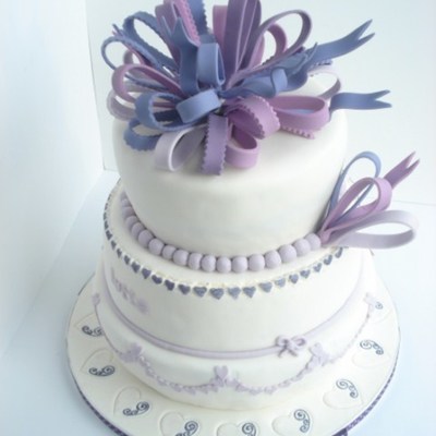 First Communion Cake In White And Purple With Hearts