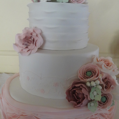 Lemon Mud Cake 1296 Inch Tiers Gumpaste Flowers And A 5050 Mix Of Gumpaste And Fondant For Ruffles On Top And Bottom Tiers And Royal Ic