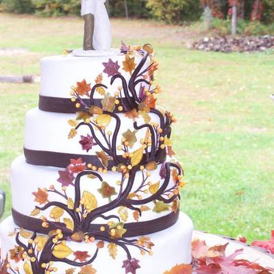 Wedding Cake For My Stepdaughter 4 Tiers Sitting On Base Of Wood All Leaves Acorns And Berries Hand Made Out Of Gum Paste Colored Sha