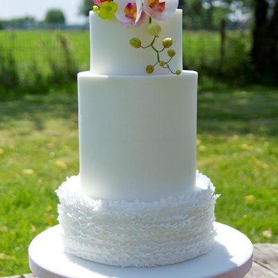 Ruffles With A 'naked' Double Barrel, Peony And Orchids On Top