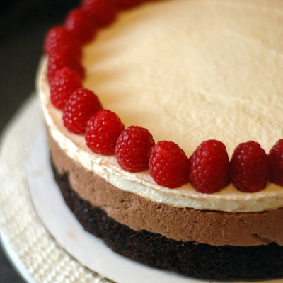 Triple Chocolate Mousse Cake With Raspberries