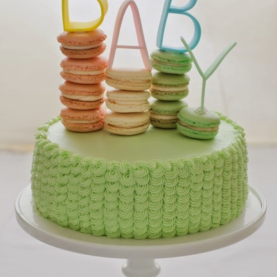 Baby Shower Peaches And Cream Layer Cake With Macarons And Handmade Fondant Letter Toppers