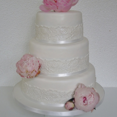 Weddingcake With Lace And Real Flowers