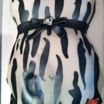 Zebra Print Preggo Belly With Baby Foot Print