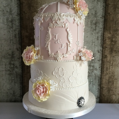 A Birdcage With Sweet Avalanche Style Roses!