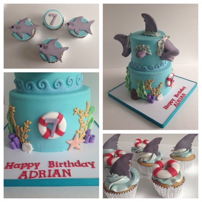 Shark Themed Cake And Cupcakes Shark Sculpted Out Of Gumpaste