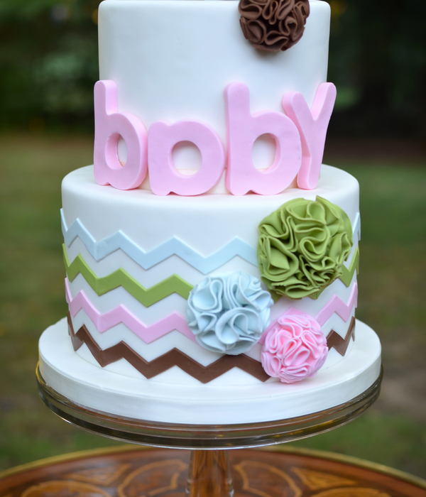 Pom Pom And Chevron Baby Shower Cake In Modern Color Range