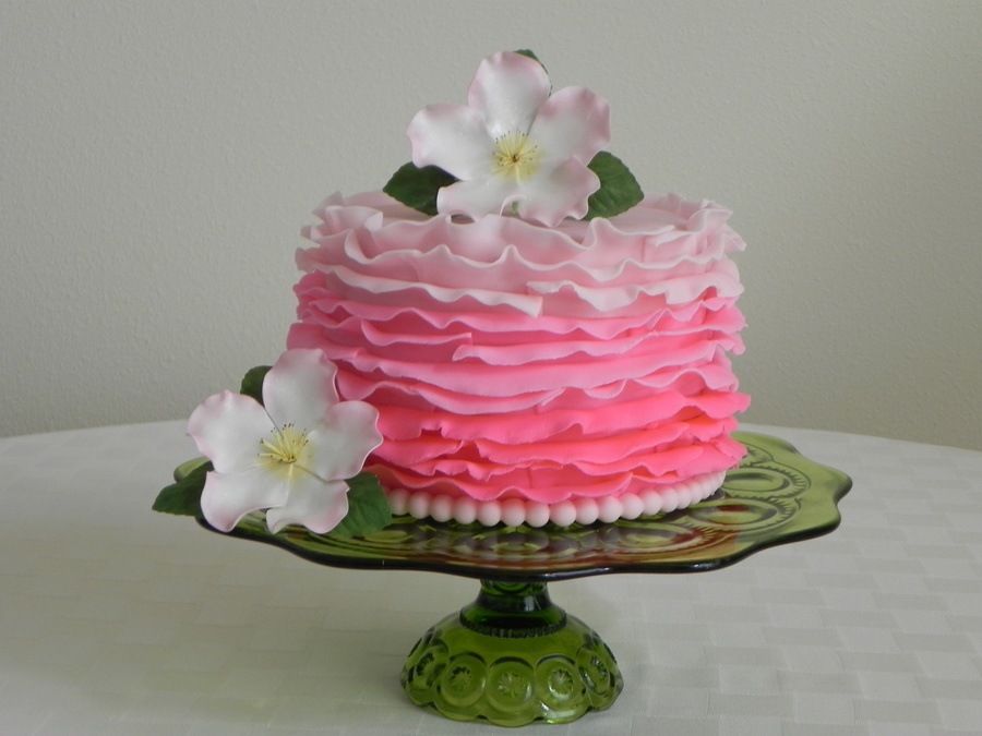 This Cake Has Pink Fondant Ombre Ruffles And Gumpaste Briar Roses