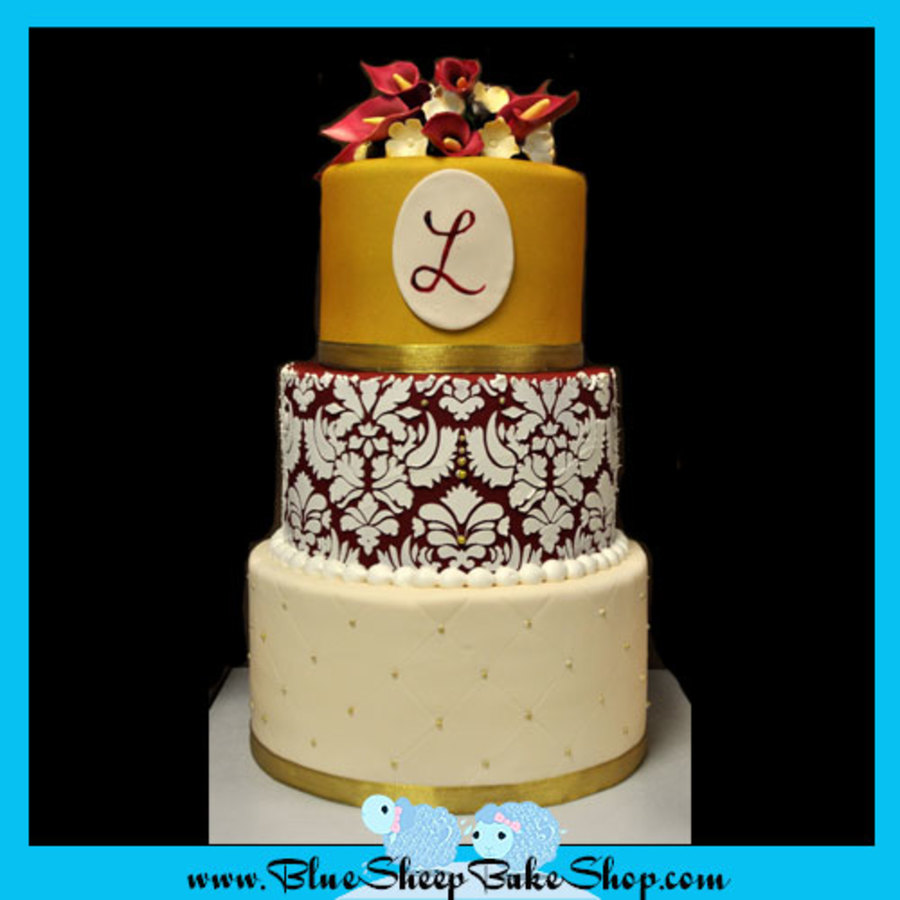 Wine, Gold, And Champagne Damask Cake