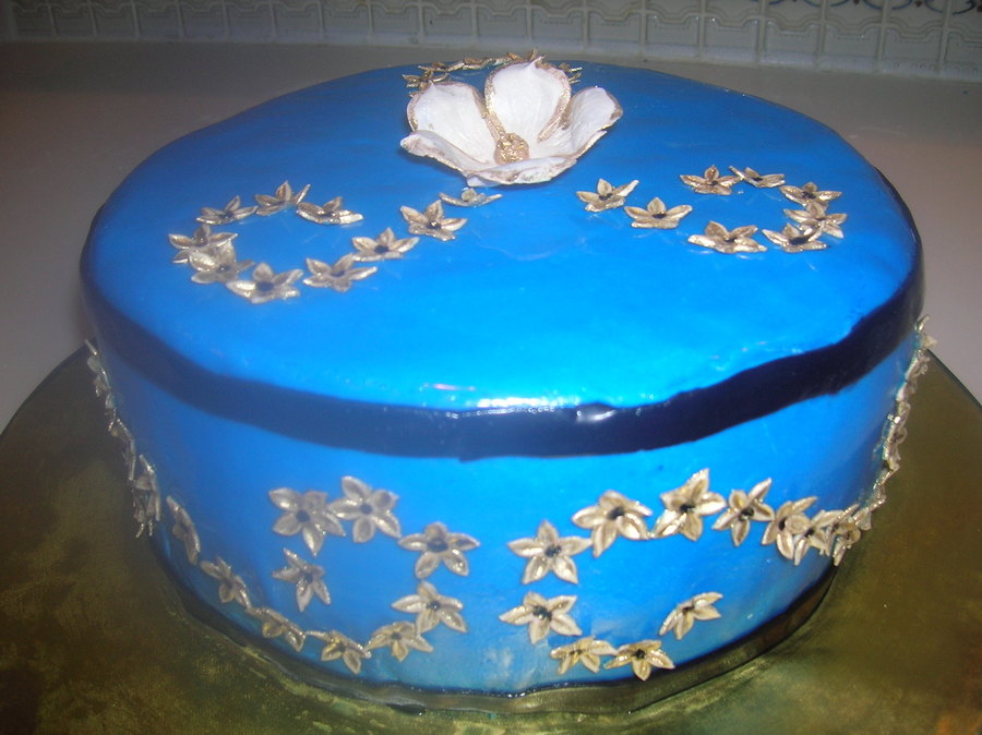 Royal Blue Cake With Gold Flowers - CakeCentral.com