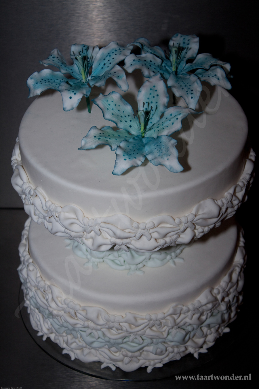 A Wedding Cake With Sugarpaste Stargazer Lily