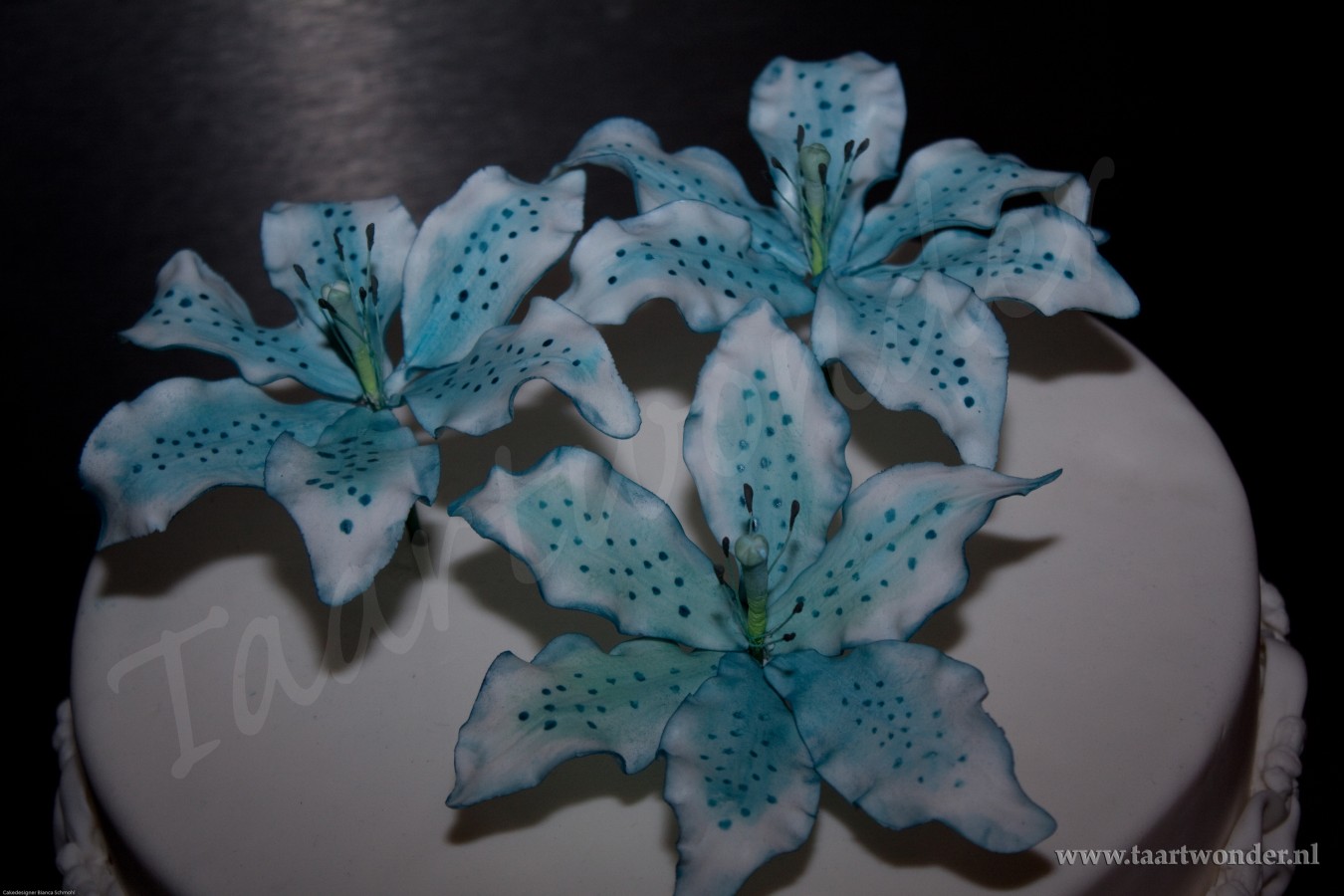 A Wedding Cake With Sugarpaste Stargazer Lily