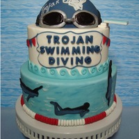 Swim Team Cake I made this cake and cupcake tower for the high school swim team end of season banquet. My son is the coach for the high school boys team...