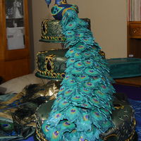 Peacock The party was for 400, the main cakes were the peacock...there were four kitchen cakes with peacock feathers.Unfortunately my client did...