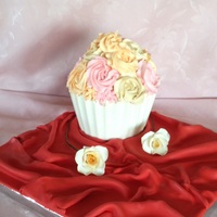 Moms Bday Just bought a new silicone cupcake mold and had some fun with it. First test was moms bday bouquet! Cupcake wrap is chocolate and roses are...