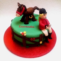 Horse And Rider Cake sugarpaste models of Lucinda and her horse on a vanilla bean sponge cake.