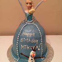 Elsa From Frozen - Doll Cake Dark chocolate with vanilla buttercream covered in fondant. Lots of fun to make. Thanks for looking. :)