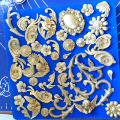 Ornate Decorations For A Ferench Edwardian Clock Cake