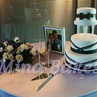 Black And White Wedding Cake This cake was ordered to celebrate Andy and Hank's union as a married couple.