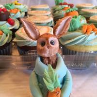 Peter Rabbit Baby Shower Cupcakes In these Beatrix Potter themed cupcakes there is a mixture of edible images and modeled and hand painted fondant pieces.