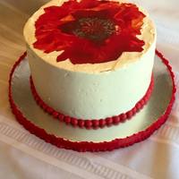 Red Poppy Chocolate filled with nutella cake adorned with a red poppy edible image.