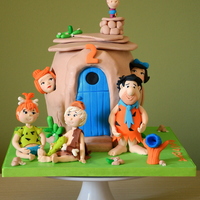 The Flintstones double barrel cake, with gumpaste figures. Yabadabadoo!