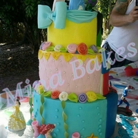 Super Heroes And Princesses - The Princess Side The princess side of the cake... I feel like I could have done more to this side... at least they customer was super happy with it.