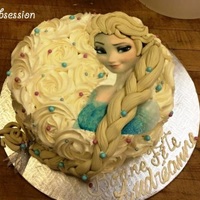 Frozen Elsa Buttercream rosettes, edible image and fondant braid!