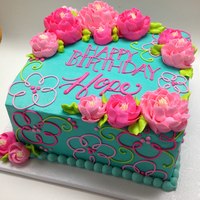 Bright Colors In Buttercream Love the flowers piped on this square cake!!