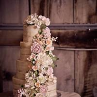 Romantic Rustic This naked cake is layers of wedding white (almond) cake with raspberry cream, covered in a super thin buttercream. The swag of gorgeous...