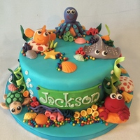 Aquarium Cake Vanilla cake with chocolate ganache, covered and decorated with fondant.