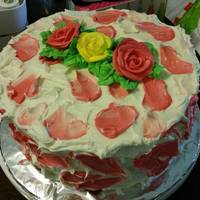Rose Petal Cake Lemon cake with rasberry icing for a cake auction locally.