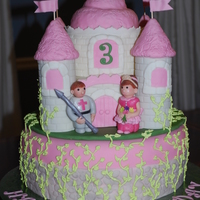 Castle Cake Fondant decorations with royal icing vines.