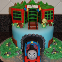 Thomas The Train Sorry to say that I don't know who initially designed this cake but it was so fun to recreate!