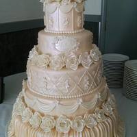 50Th Wedding Anniversary Cake 5 tiers, 6,9,12,15 and 18 inches. All flowers and decoration handmade.