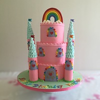 Rainbow Castle Birthday Cake Rainbow castle cake for my daughter's 5th birthday! Top tier was vanilla and the rest was cookies n cream.