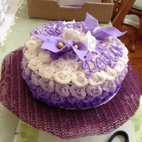 Purple Ombr&eacute; Birthday Buttercream Ombr&eacute; rosettes with purple fondant Cala Lilies