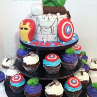 Superhero Chocolate cake and cupcakes with Vanilla Buttercream, decorated in LMF. I need to give a shout out to the designer that I borrowed the...