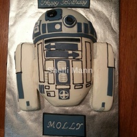 R2D2 Cake This is a buttercream cake with fondant accents. It is a ball cake for head and 8 inch round cakes cut in half and turned on the side for...