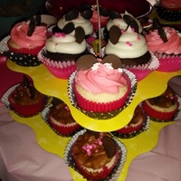 Minnie Mouse Cupcakes Made these for my grand-daughters b-day. I did some with vanilla buttercream and some with strawberry buttercream and also did a variety of...