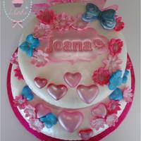 Girly Birthday Cake A sweet birthday cake for a girl, in pink, with hearts and butterflies :)