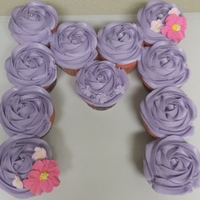 Monogram Cupcake Cake "M" shaped cupcake cake with edible royal icing flowers and pearls.