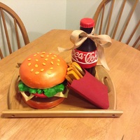 Hamburger And Fries Cake Fondant covered cake with fondant fries the fry box is made of card stock paper the bottle is cake covered in buttercream and fondant