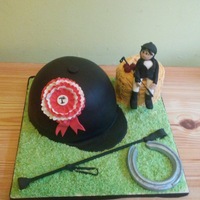 Horse Riding Novelty Cake The hat is a Madeira sponge covered with white chocolate ganache and filled with raspberry conserve and vanilla cream. The hay bale is made...