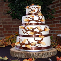 Fall Wedding Cake Fondant cake with branches, berries, and leaves. Four Tiers (14", 12", 9", 6") covered in IMBC and then Michelle Foster...