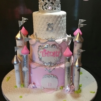 Pink Princess Castle Cake I created this castle themed cake with fondant PVC piping and I custom made the crown. Lights were added for a extra effects, and all the...